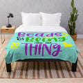 Plush blanket with beaded and bling design