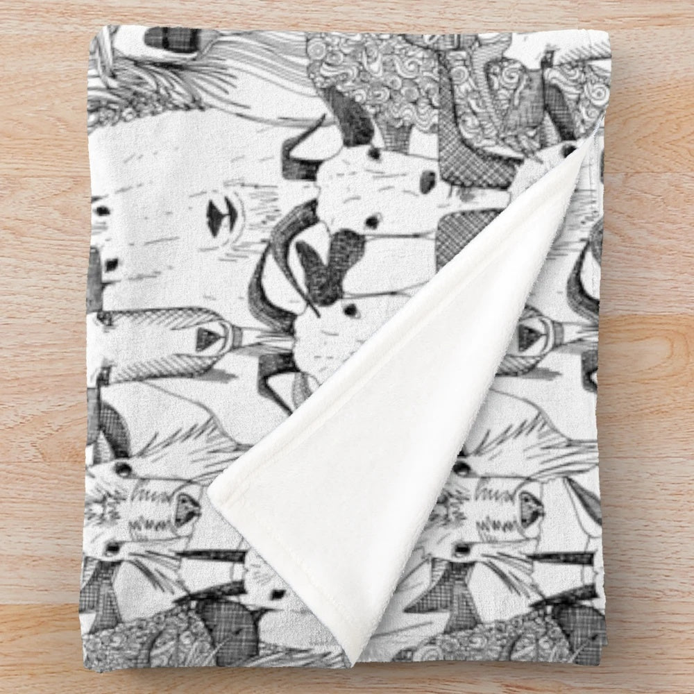 Plush blanket with a black and white goat pattern