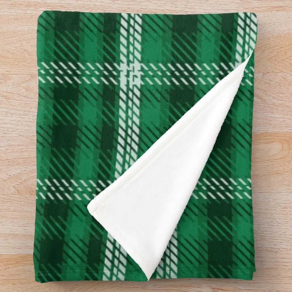 Plush blanket with traditional Scottish tartan plaid pattern