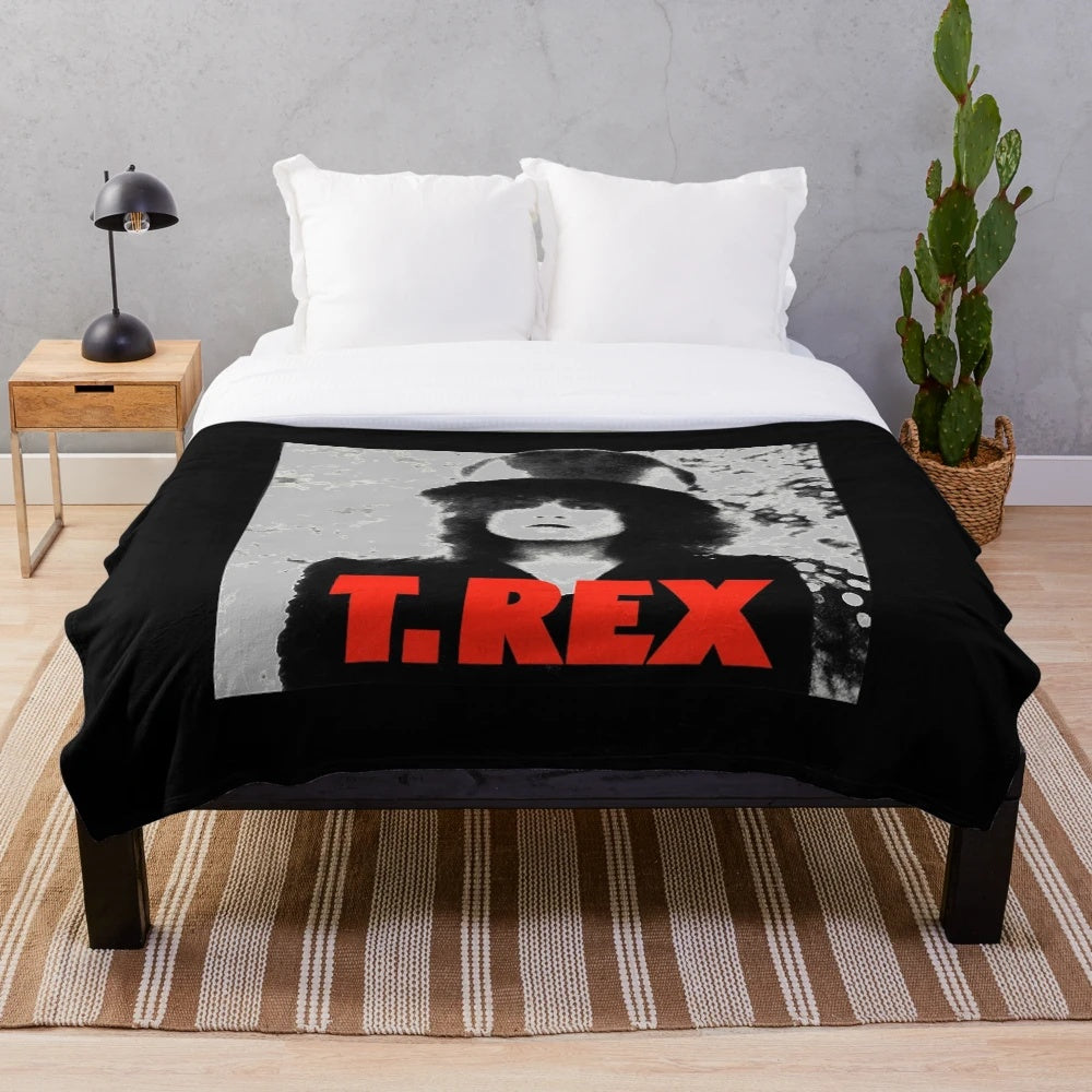 Cozy plush blanket featuring a dinosaur and 1970s music theme