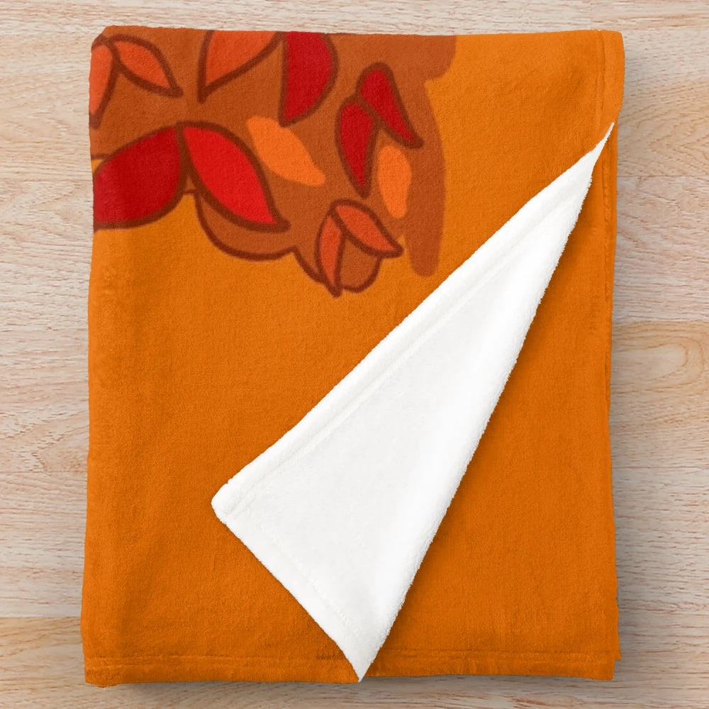 Plush blanket with fall leaves and puppy design