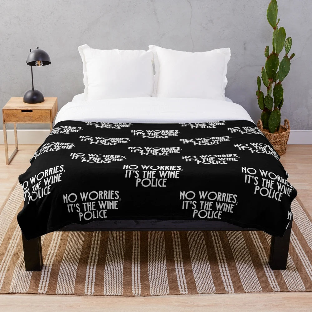 Colorful plush blanket featuring a variety of family, movie, and humor-themed designs