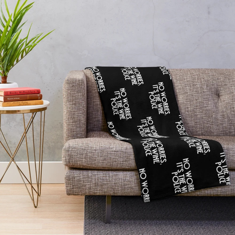 Colorful plush blanket featuring a variety of family, movie, and humor-themed designs