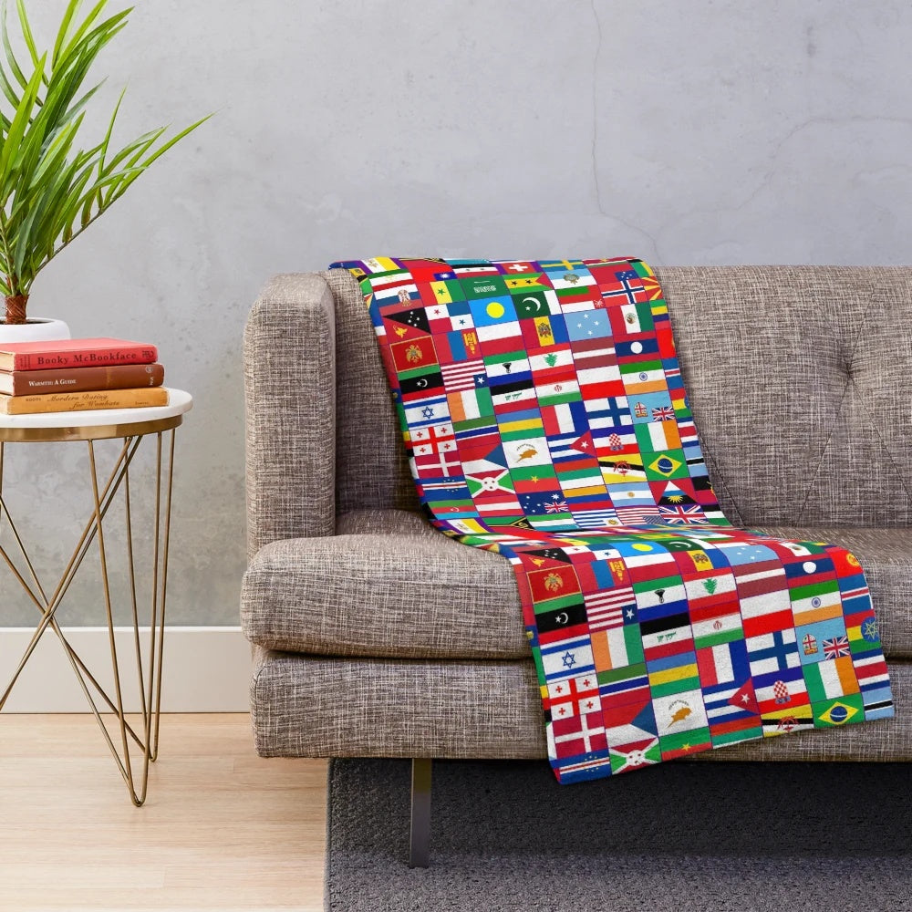 Plush blanket featuring flags of the world design