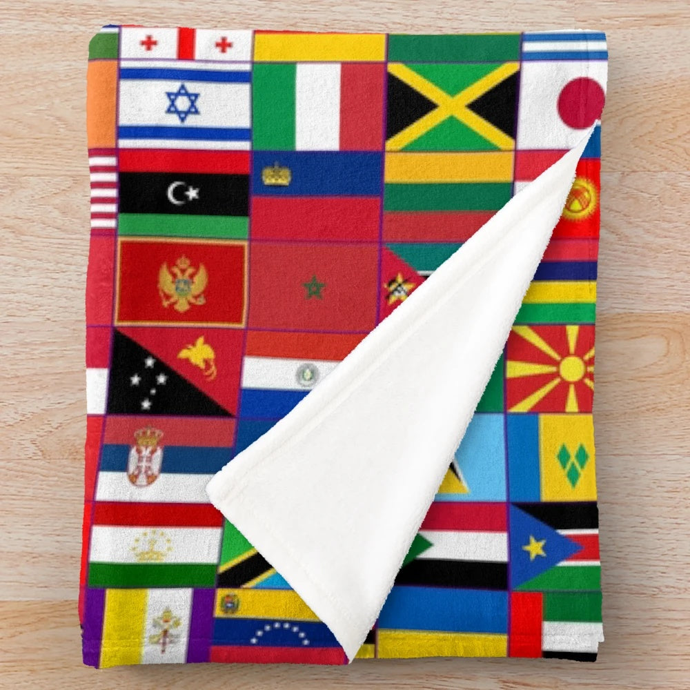 Plush blanket featuring flags of the world design
