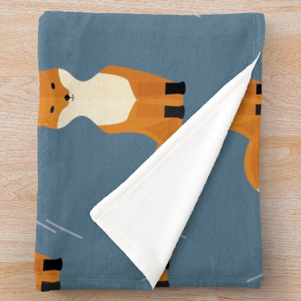 Plush blanket featuring a pattern of foxes in an autumn forest scene