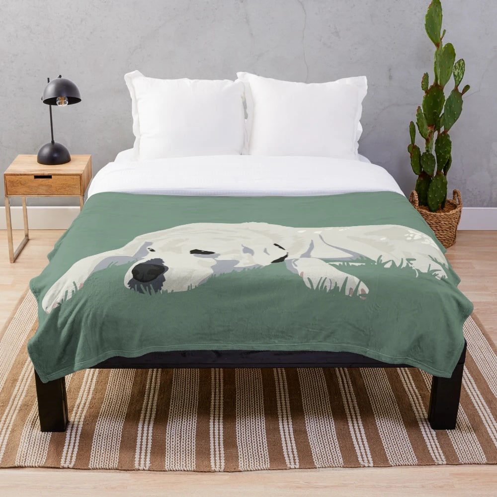 Plush blanket with an illustration of a large, furry dog