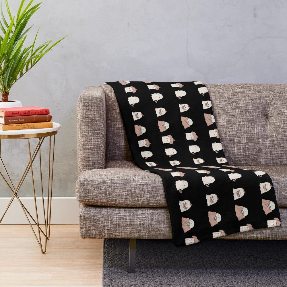 Cozy plush blanket featuring Halloween ghost design