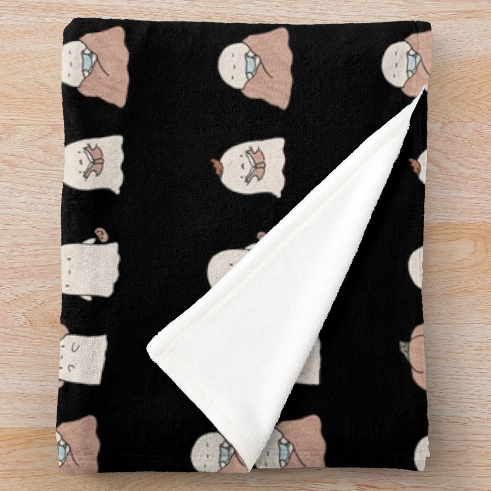 Cozy plush blanket featuring Halloween ghost design