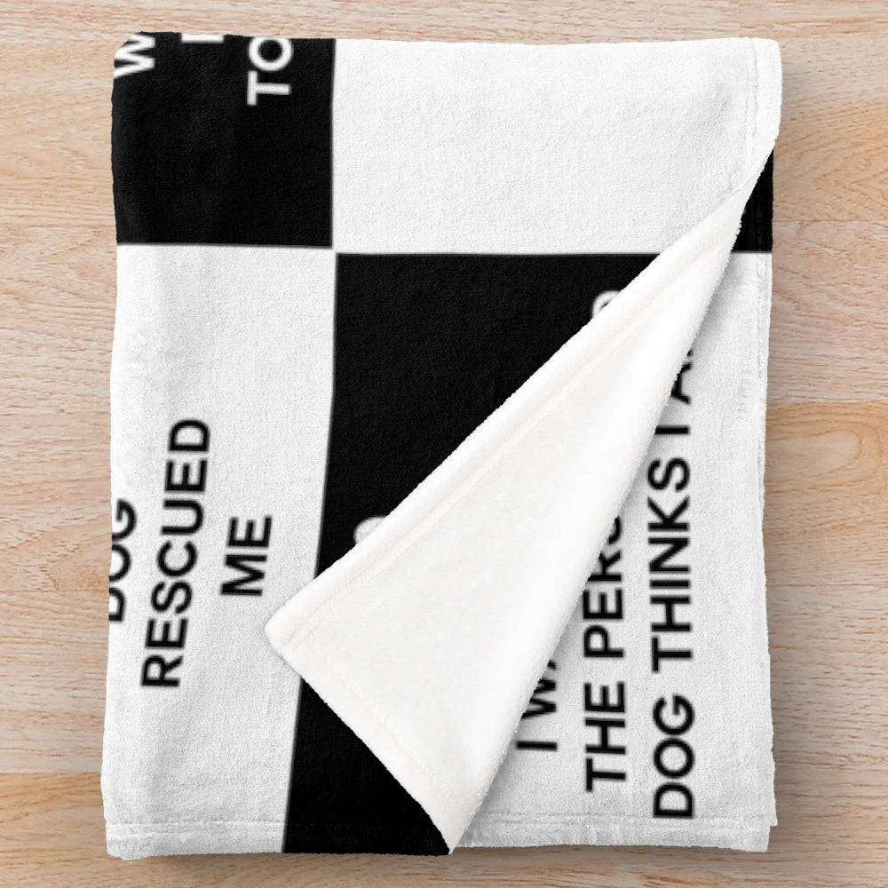 Plush dog lover blanket with black and white checkered pattern and dog quotes