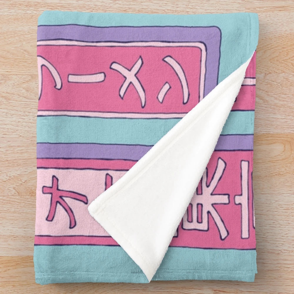 Plush blanket featuring Japanese-inspired street sign design