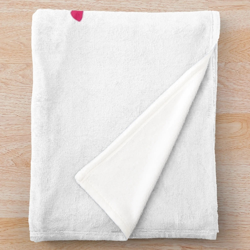 Plush knitting-themed blanket