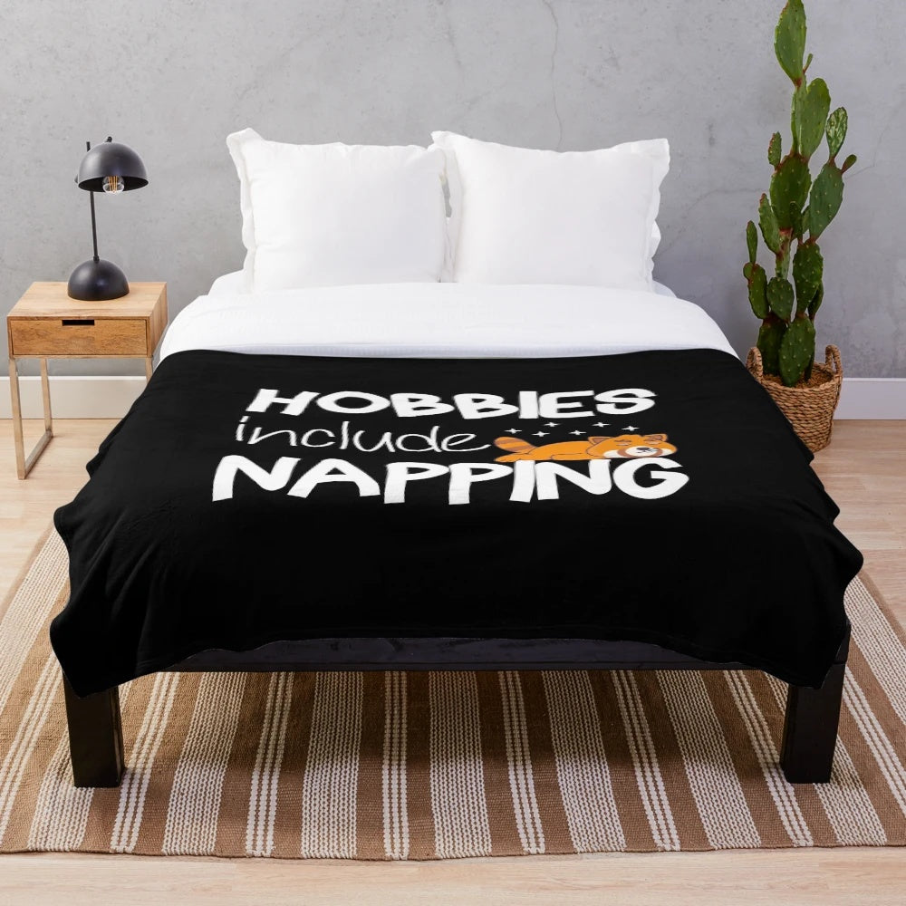 Plush blanket featuring a lazy raccoon design, perfect for sleep lovers and nappers.