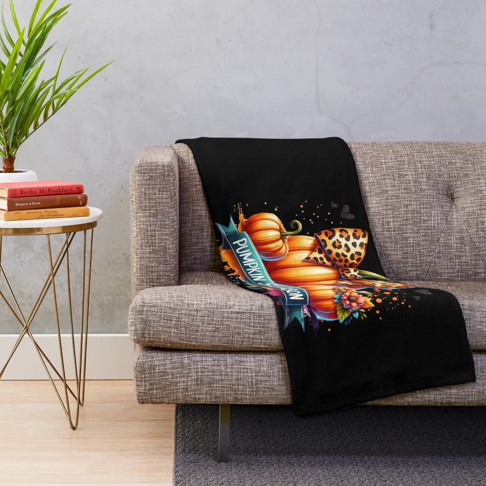 Plush blanket with a watercolor leopard pumpkin design for fall home decor