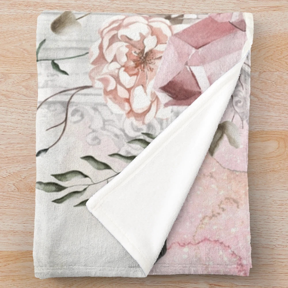 Soft, plush blanket with a watercolor print and a love quote