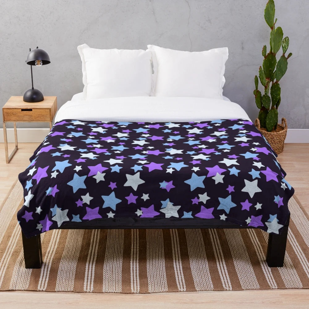 Plush star pattern blanket in purple and blue colors