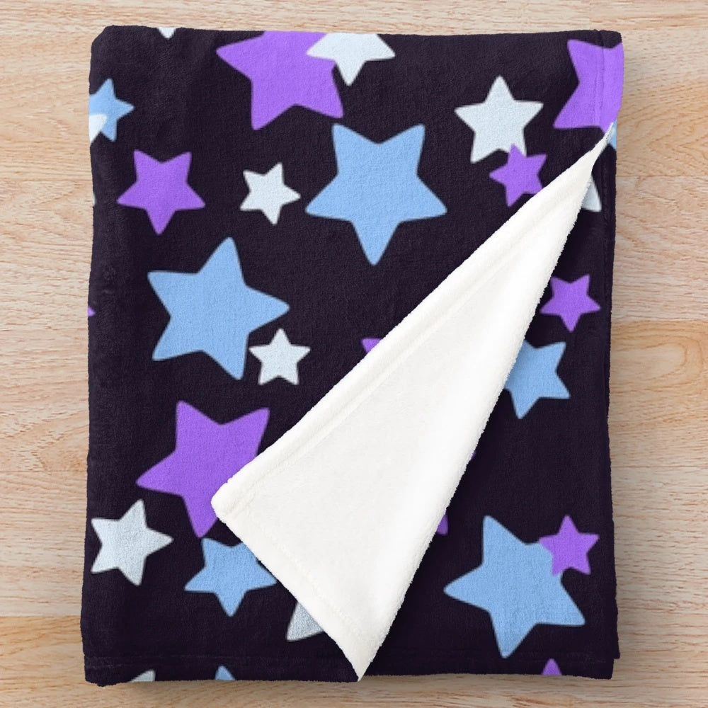 Plush star pattern blanket in purple and blue colors