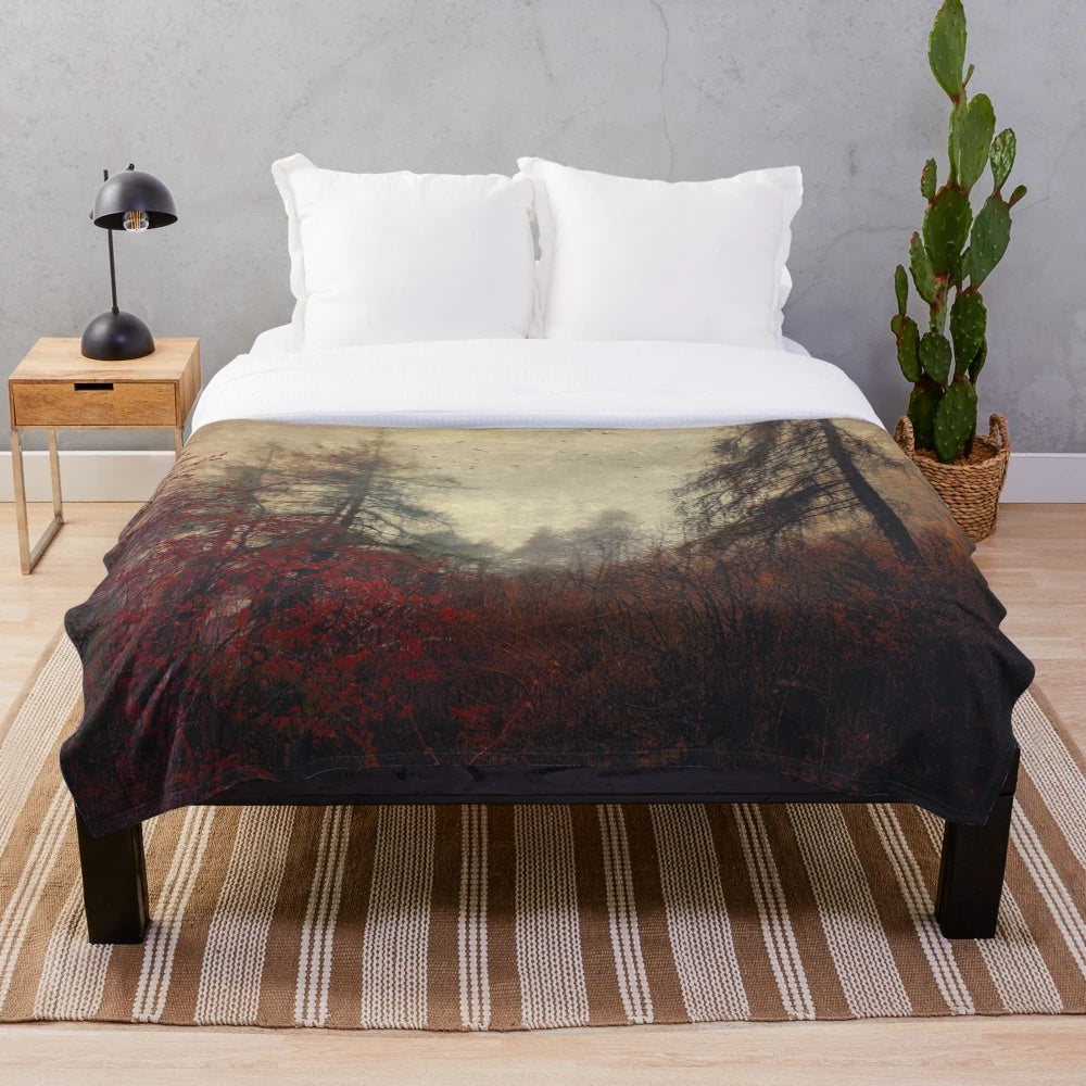 Plush blanket featuring a misty mountain forest with autumn foliage and birds