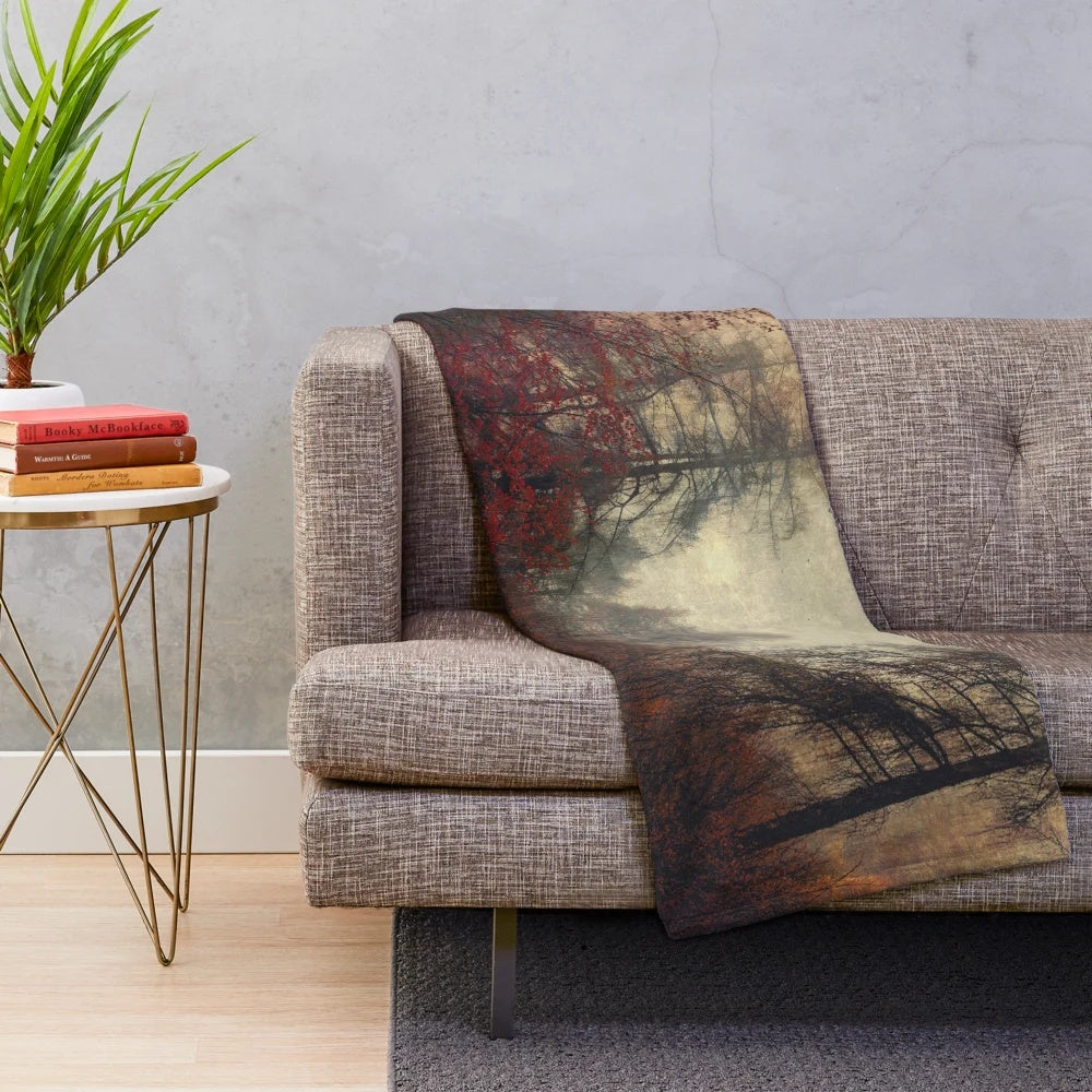 Plush blanket featuring a misty mountain forest with autumn foliage and birds