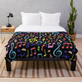 Plush blanket with a vibrant music note pattern design