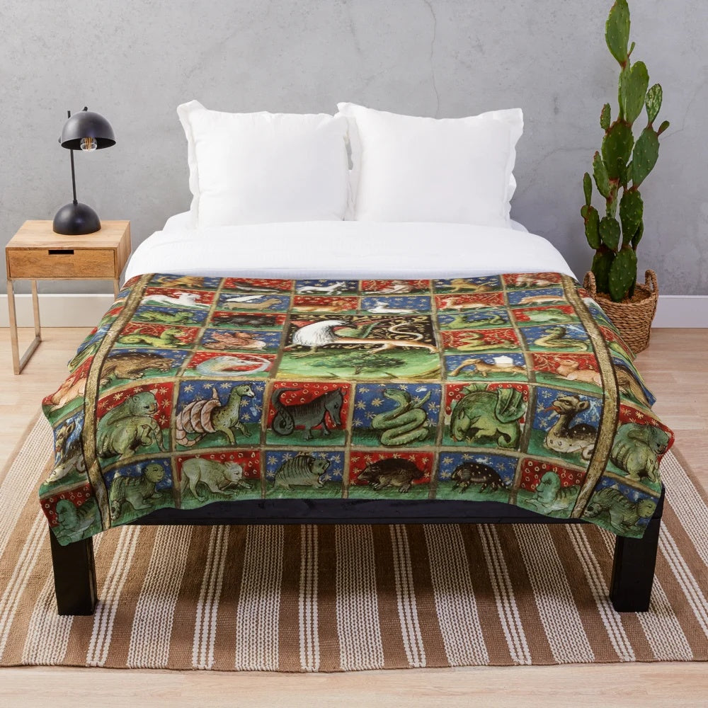 Plush medieval bestiary blanket with colorful fantasy animals