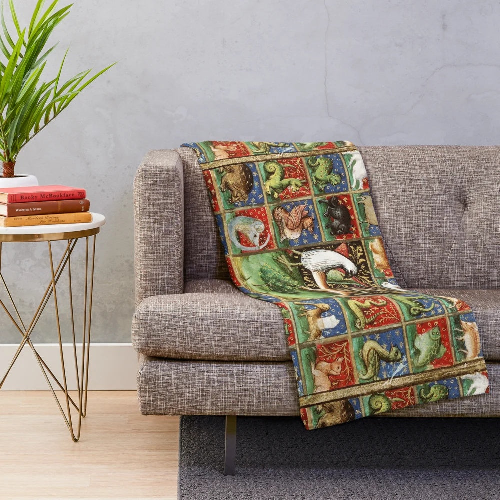 Plush medieval bestiary blanket with colorful fantasy animals
