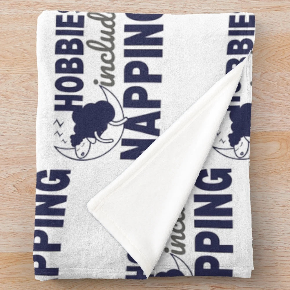 Plush blanket with a design of sheep napping, perfect for cozy naps and relaxation