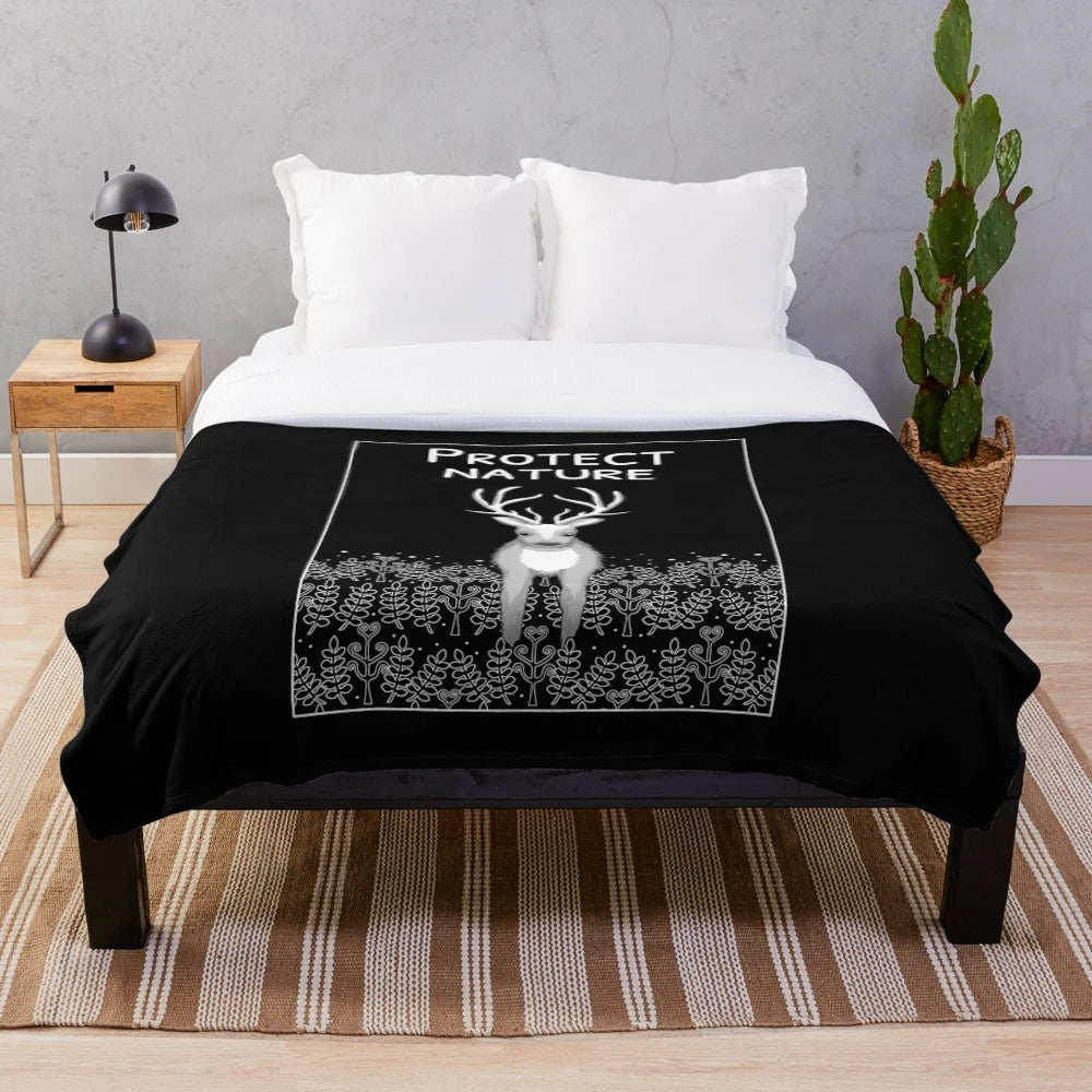 Cozy plush blanket with nature and animal motif