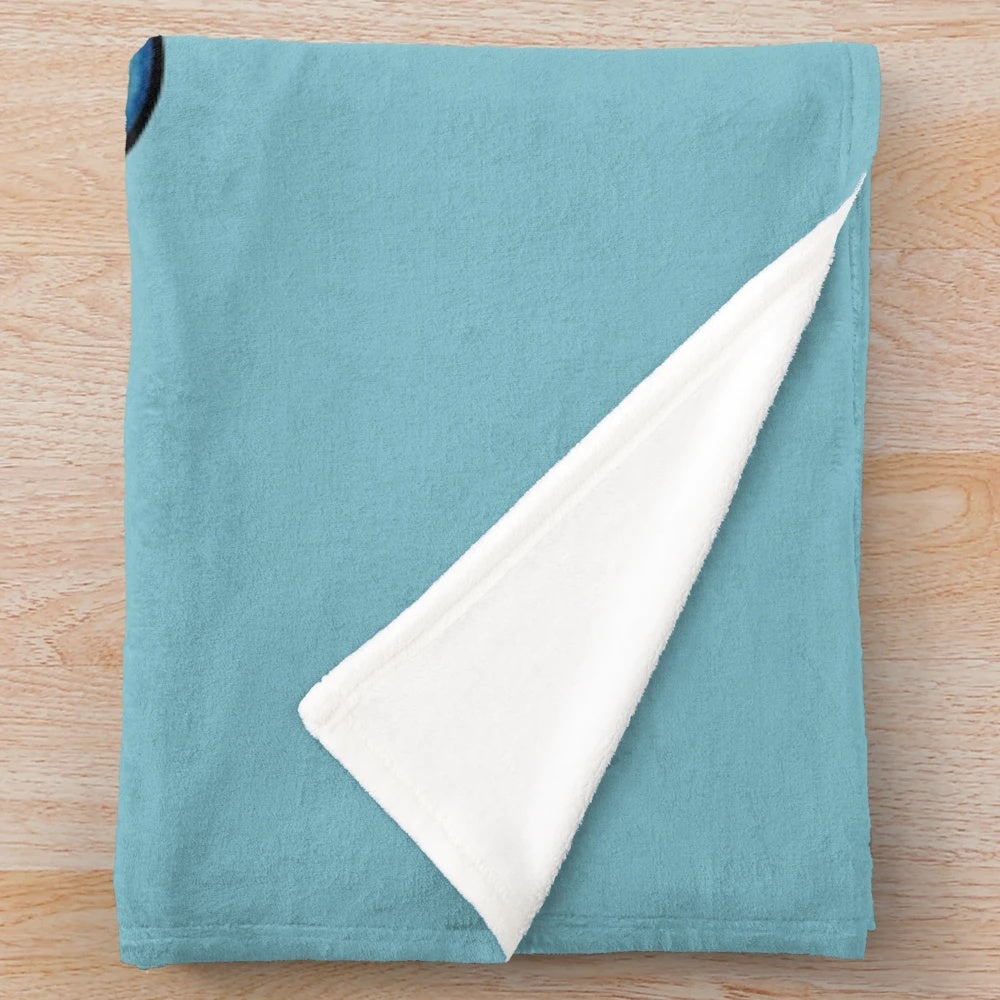 Soft and cuddly plush blanket featuring a marine life design, promoting plastic-free living.