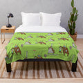 Plush blanket featuring playful tea time characters