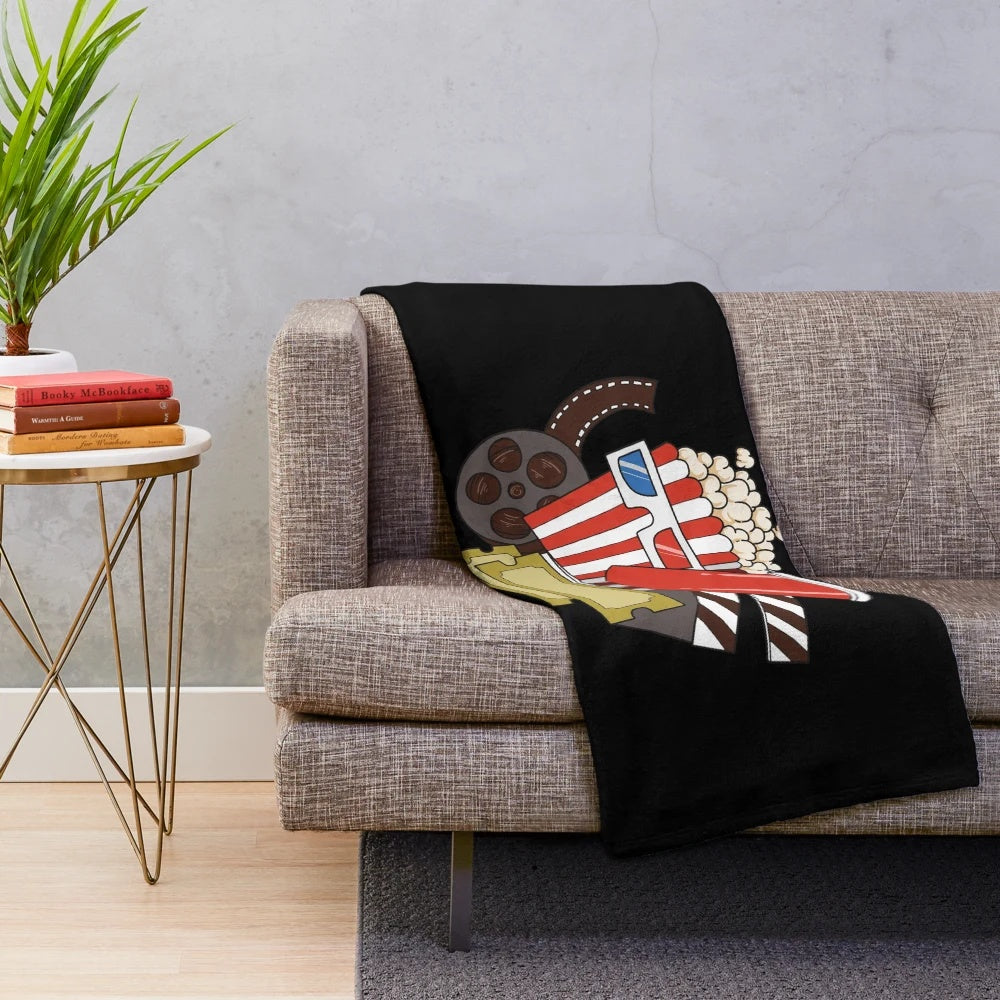Plush blanket with a popcorn design for film fans and movie enthusiasts
