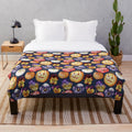 Plush blanket with watercolor pattern of pumpkins and pansies