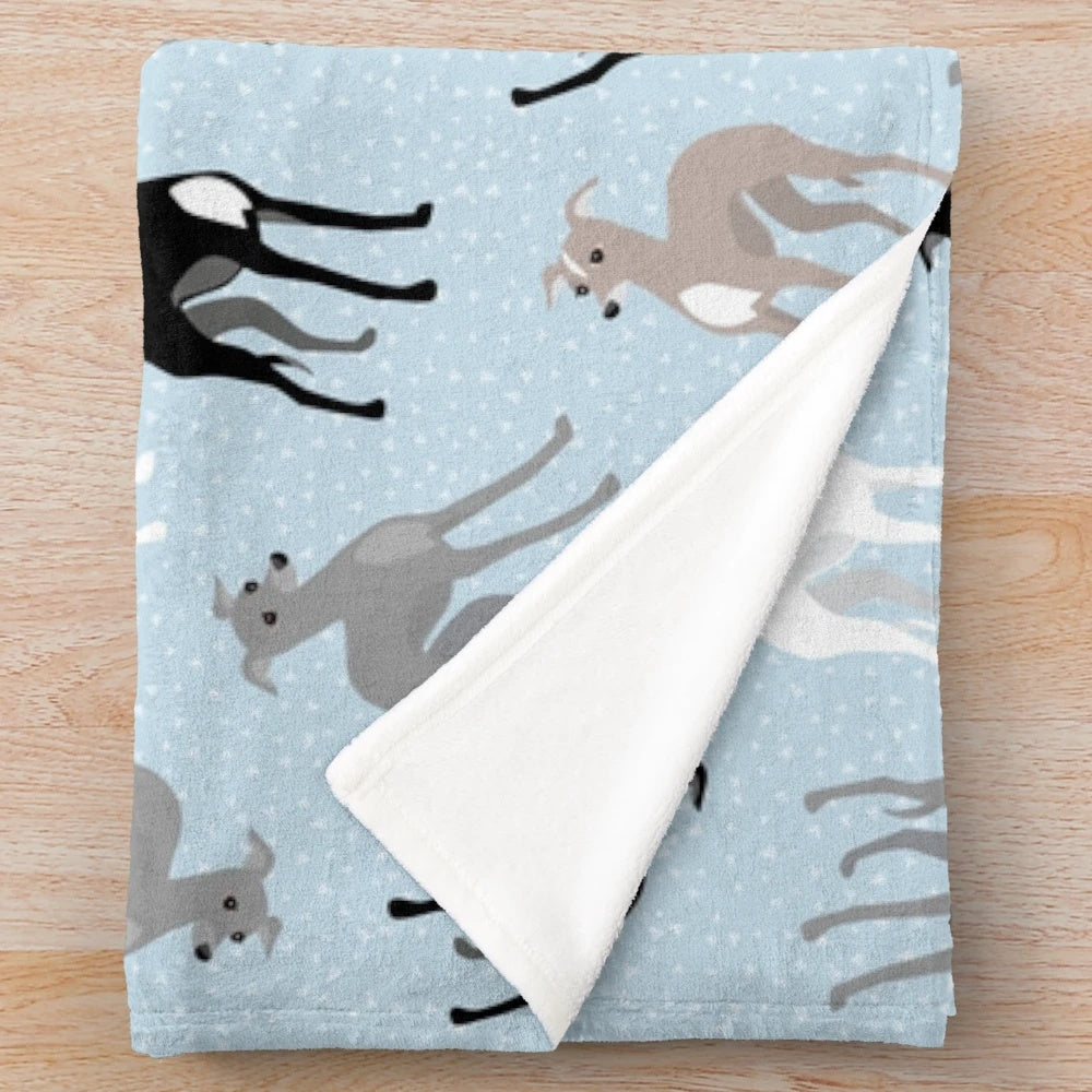 Plush blanket with a retro-style pattern featuring Italian greyhounds and whippets