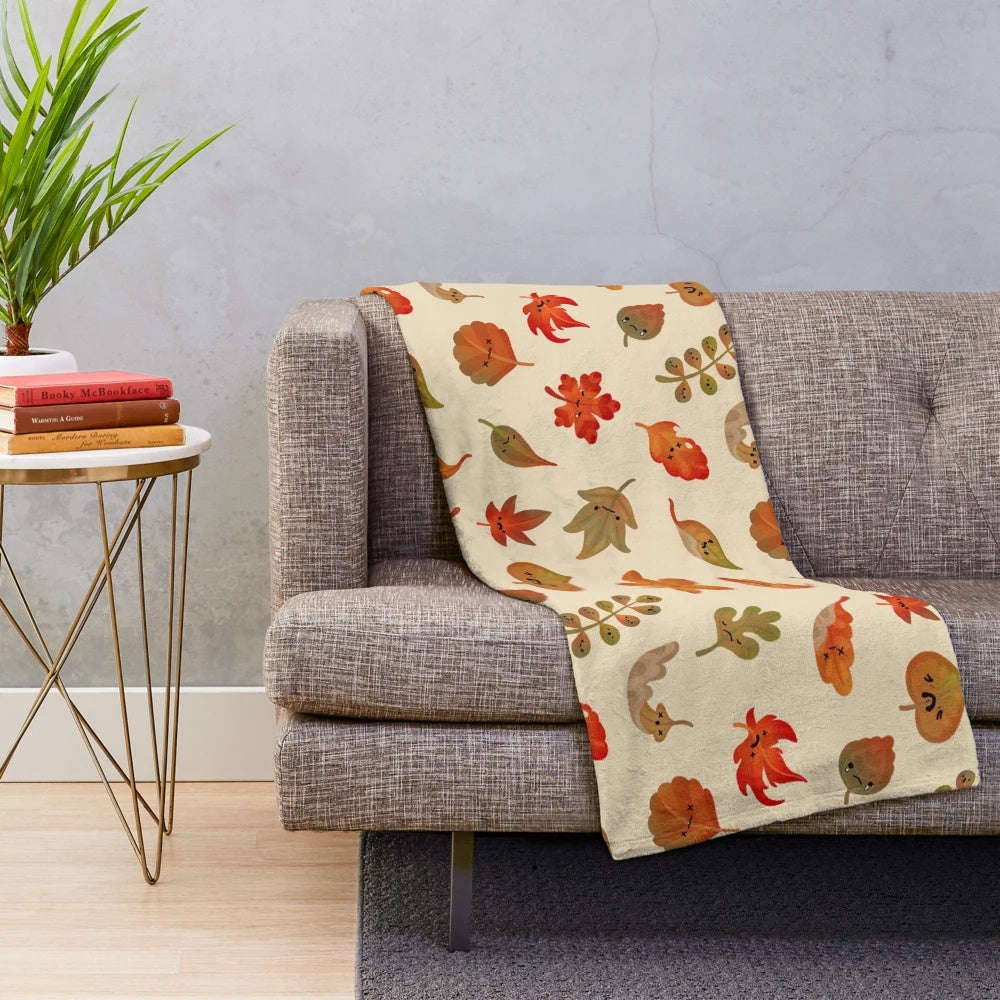Plush blanket featuring a sad fallen leaves design