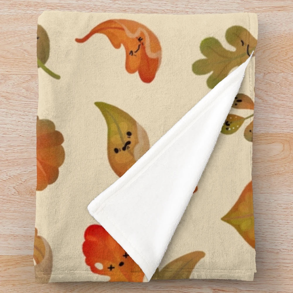 Plush blanket featuring a sad fallen leaves design