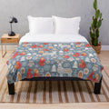 Plush blanket with seamless pattern of winter forest, deer, owl and fox in Scandinavian style
