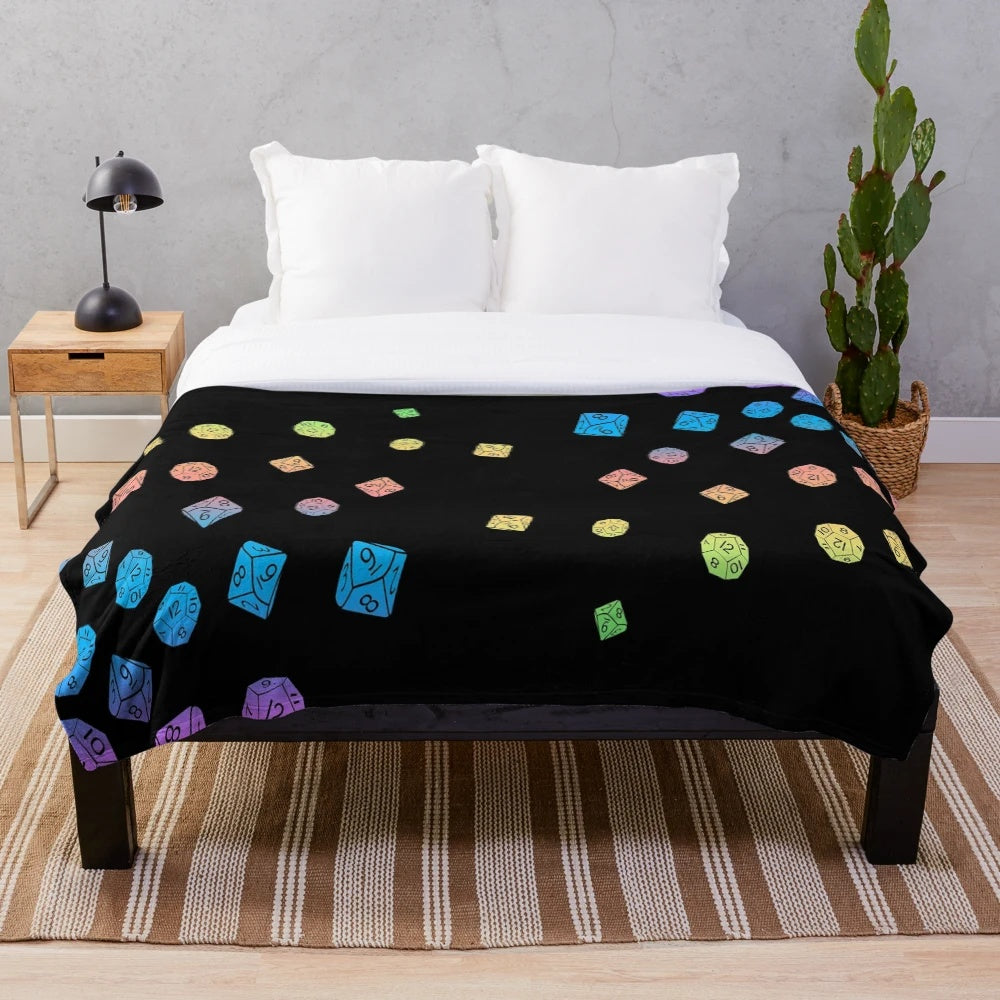 Plush blanket with a colorful scattered dice pattern