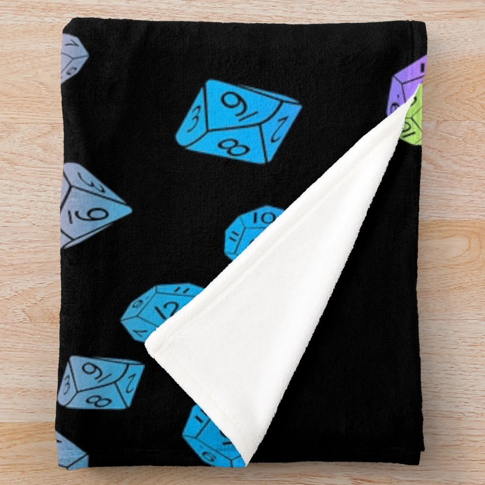 Plush blanket with a colorful scattered dice pattern