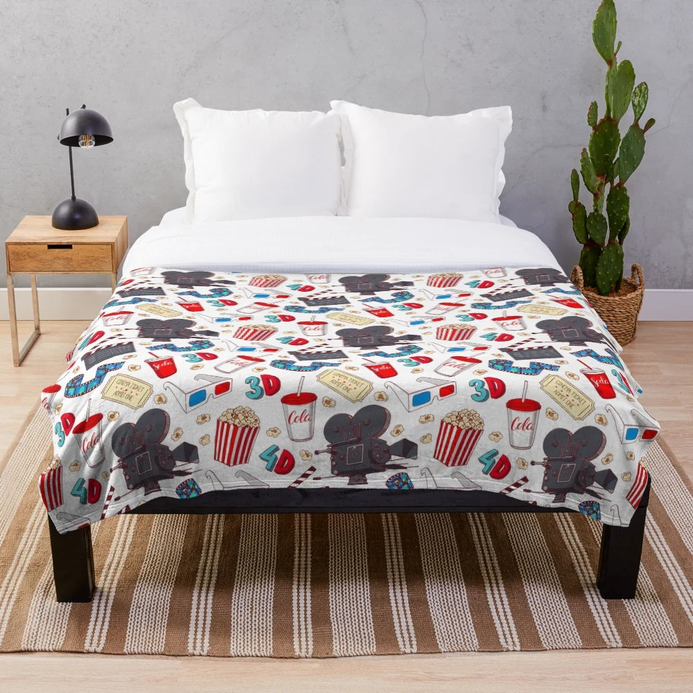Plush blanket with a hand-drawn, seamless cinema-themed illustration