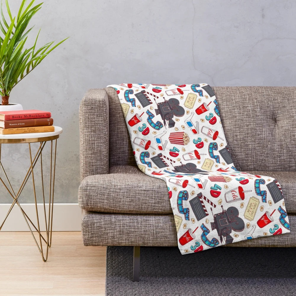 Plush blanket with a hand-drawn, seamless cinema-themed illustration