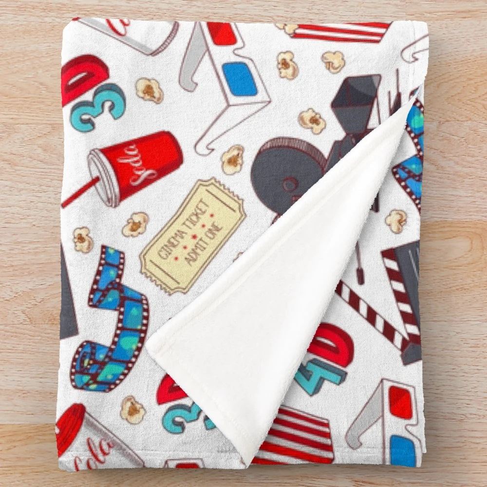 Plush blanket with a hand-drawn, seamless cinema-themed illustration