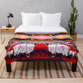Plush blanket featuring a sheep and lamb in an autumn landscape with mountains and sunset