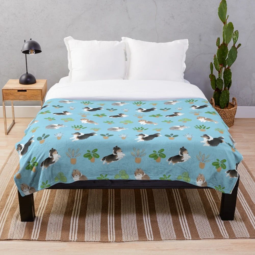 Soft and plush blue blanket featuring a Shetland sheepdog (sheltie) and a calathea house plant