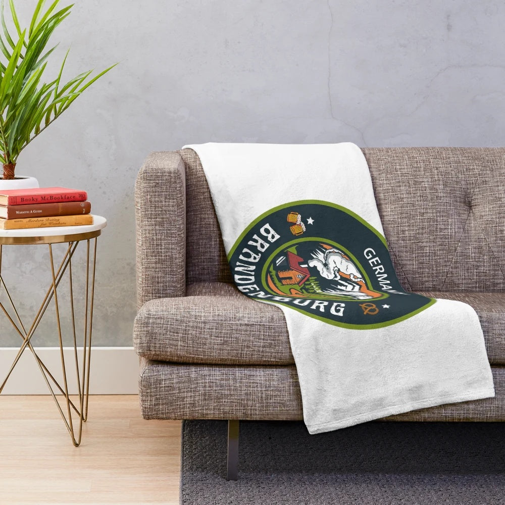 Traditional German green emblem design on a plush, cozy blanket