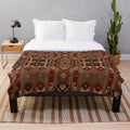 Plush blanket with native american inspired tribal pattern