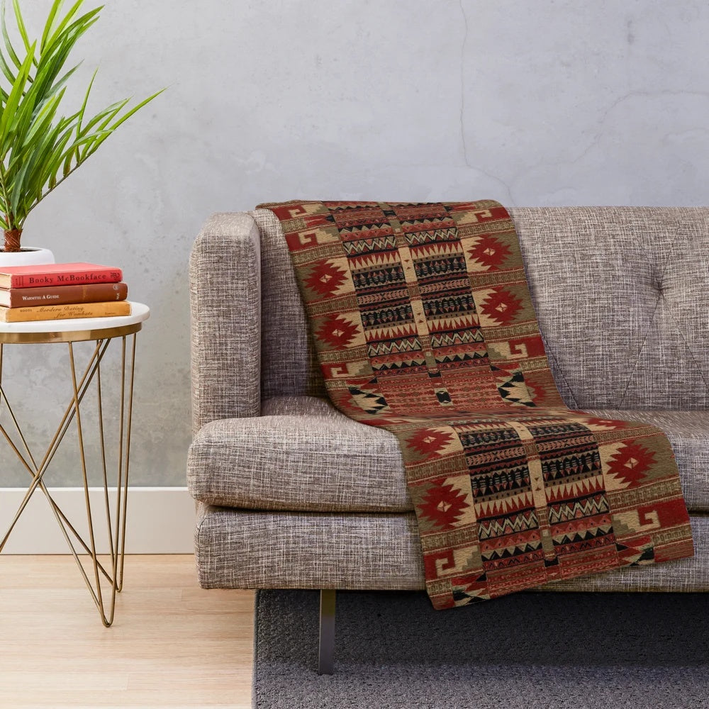 Plush blanket with native american inspired tribal pattern