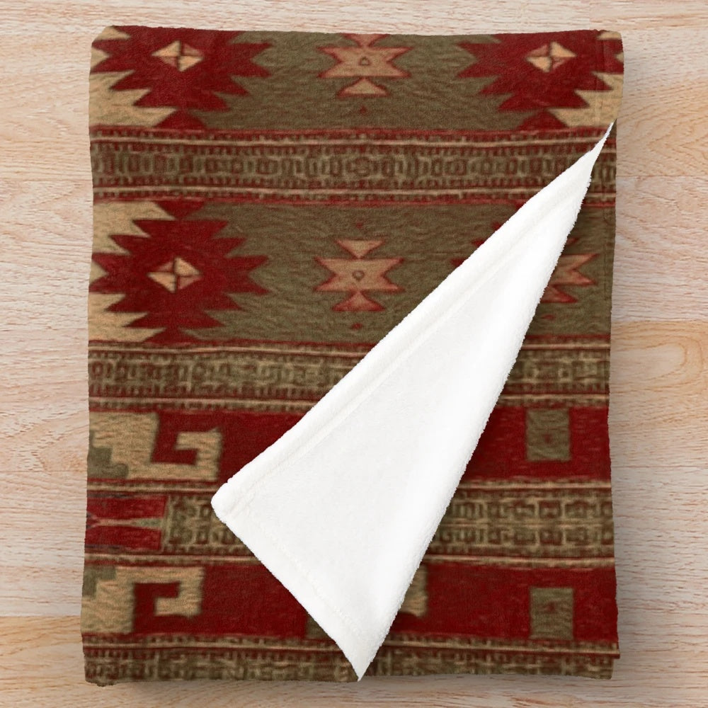 Plush blanket with native american inspired tribal pattern