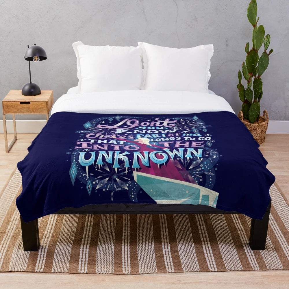 Plush blanket with hand lettered winter-themed typography art