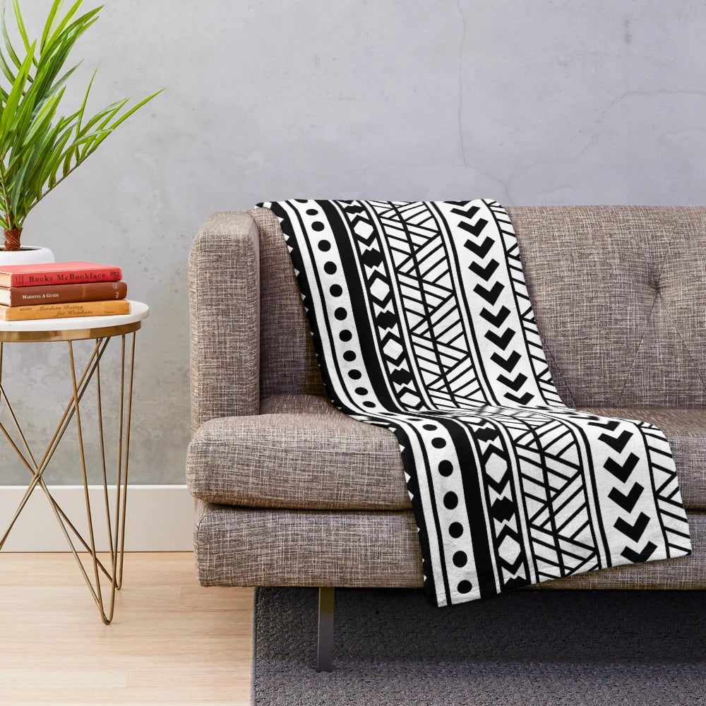 Plush blanket with vibrant American Samoa-inspired patterns