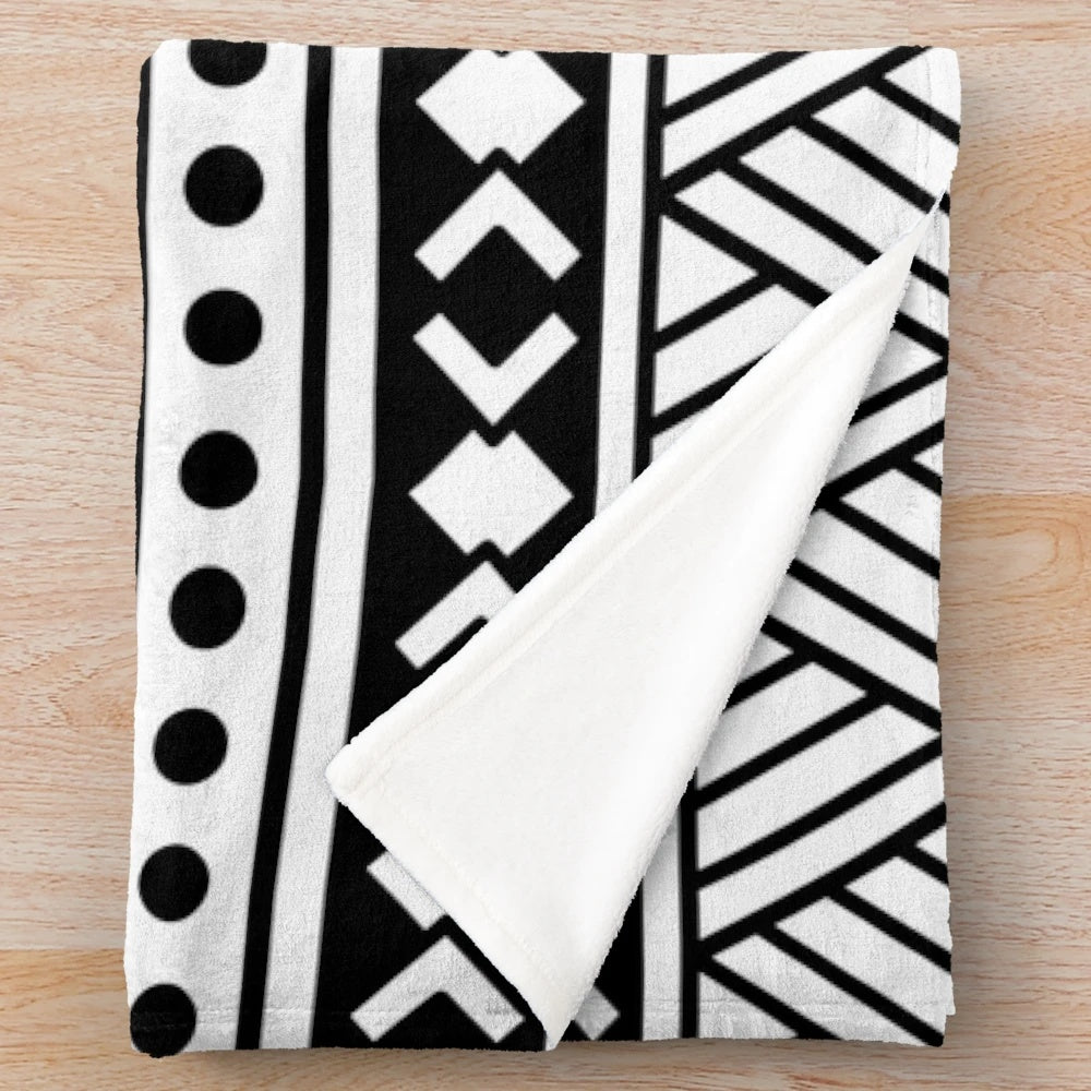 Plush blanket with vibrant American Samoa-inspired patterns